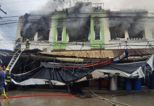 Janiuay fire leaves P2.4-million damage Smoke blankets the second floor of this commercial building in Barangay Jibolo, Janiuay, Iloilo on June 11, 2021. Firefighters from Janiuay, Calinog, Cabatuan, and Maasin towns responded. JAPHET FARJARDO/PN