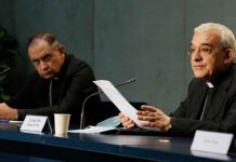 New Vatican law criminalizes abuse of adults, even by laity In a press conference, Mons. Filippo Iannone, right, and Mons. Juan Ignacio Arrieta Ochoa de Chinchetru illustrates changes in the Church's Canon law, at the Vatican, Tuesday, June 1, 2021. Andrew Medichini/AP