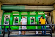 People transact at a bank’s automated teller machine terminal on Solis Street, Iloilo City. A panel of House lawmakers have approved House Bill 7619 or the “Bank Account Portability for Workers Act,” which allows private sector employees to choose the bank account where their wages may be deposited. PN FILE PHOTO