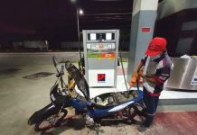 Oil prices rise; Saudi to cut output A gasoline boy refills the fuel tank of a motorcycle in a gasoline station in Pavia, Iloilo. Starting today, oil firms will impose price hike on gasoline, diesel, and kerosene. JAP FAJARDO/PN