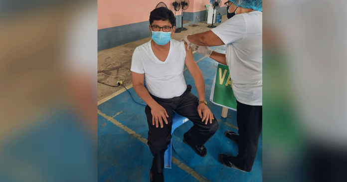Mayor Emmanuel Galila of Nueva Valencia, Guimaras receives his second dose of CoronaVac vaccine against coronavirus disease on June 22. NUEVA VALENCIA LGU PHOTO