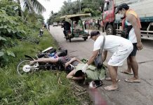 A truck hit a motorcycle in Barangay Antipolo, Pontevedra, Negros Occidental around 5:45 a.m. on June 1, killing two residents of Barangay Buenavista Rizal, Pontevedra. PHOTO BY GRACE SUPE/RMN-DYHB BACOLOD