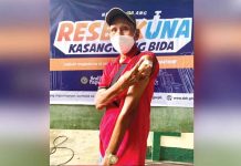Roberto Zubiaga, Aklan’s first case of coronavirus disease 2019, gets vaccinated a year after surviving the infection.