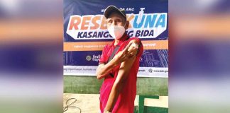 Roberto Zubiaga, Aklan’s first case of coronavirus disease 2019, gets vaccinated a year after surviving the infection.