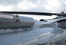 Colombia offers reward for info on helicopter attack Photos released show bullet holes in the aircraft. PRESIDENCY OF COLOMBIA/REUTERS