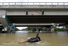 Heavy rain, floods kill at least 17 in Sri Lanka A man floats on a tube down a flooded road during a coronavirus disease 2019 curfew in Kaduwela, a suburb town of Colombo, Sri Lanka. REUTERS/DINUKA LIYANAWATTE