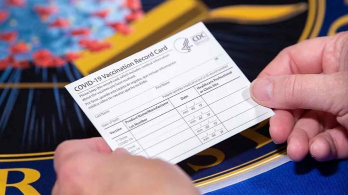 vaccine-card EJ Hersom/Defense.gov