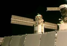 Nauka (center) joins the ISS high above the border between Mongolia and China. NASA