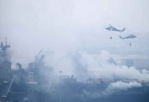 US Navy helicopters carry more than 1,500 water bucket drops to contain the raging fire in the USS Bonhomme Richard in 2020. REUTERS