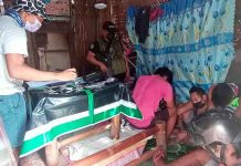Drug sting op nabs 7 Anti-drug operatives inventory the items recovered in a buy-bust operation in Barangay 5, San Carlos City, Negros Occidental on July 29. PDEA-6
