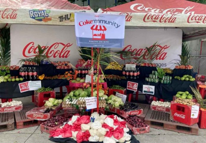 coke-1 To mark their 109th anniversary in the Philippines, Coca-Cola installs community pantries inside their distribution centers and plants nationwide and distributed essential packs to people in the communities.