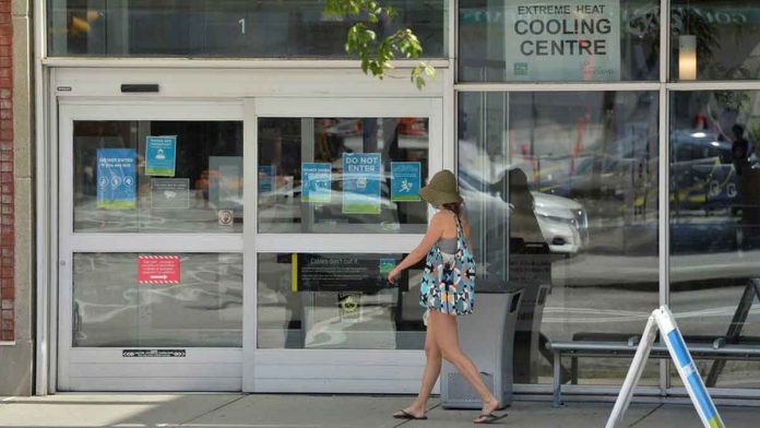 heatwave A woman enters a cooling center set up in Vancouver, Canada. REUTERS