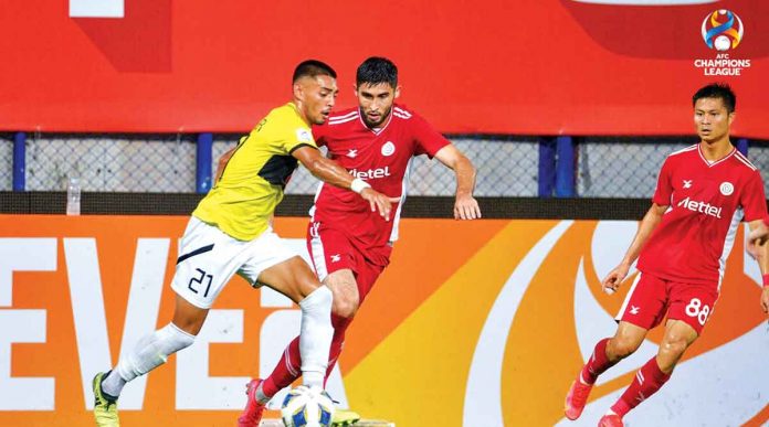Kaya Futbol Club-Iloilo’s Dylan De Bruycker (21) tries to win the ball against Viettel FC’s Jahongir Abdumuminov during their 2021 AFC Champions League group stage game in Bangkok, Thailand. AFC