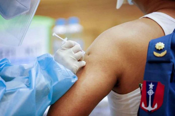 myanmar-vaccine A member of the armed forces in the parliament receives the AstraZeneca Covishield coronavirus disease 2019 vaccine in Naypyidaw, Myanmar. REUTERS/THAR BYAW/FILE PHOTO
