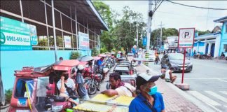 These long queue of drivers wait for passengers at the district plaza of Arevalo, Iloilo City for hours. A driver tells Panay News only one passenger is also allowed to board each vehicle. Drivers hope for relief from the government to alleviate their economic woes amid the city’s enhanced community quarantine. JAPHET FAJARDO/PN