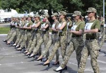 Ukrainian female soldiers wear heels while taking part in the military parade rehearsal in Kyiv, Ukraine. UKRAINIAN DEFENSE MINISTRY PRESS OFFICE VIA AP