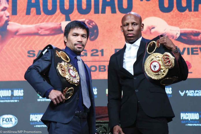 Sports-banner Manny Pacquiao (left) and WBA welterweight champion Yordenis Ugas face off in a pre-fight press conference on Wednesday (Thursday in the Philippines) ahead of their August 21 battle at the T-Mobile Arena in Las Vegas, Nevada. ENDELL ALINEA