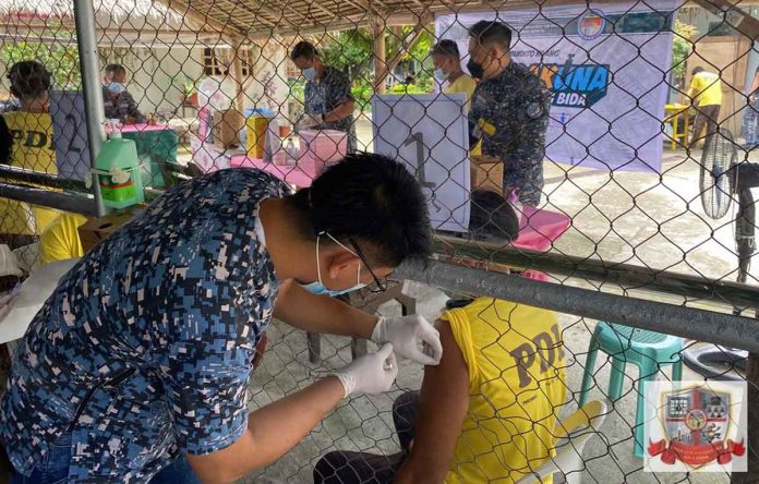 detainees-pic A person deprived of liberty receives his first dose of the Sinovac vaccine at the Iloilo District Jail Male Dormitory of the Bureau of Jail Management and Penology in Barangay Ungka, Jaro, Iloilo City. ICDJ-MD/BJMP