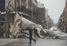 Hurricane Ida lashes Louisiana, knocks out New Orleans power A man passes by a section of the roof blown off of a building in the French Quarter in New Orleans by Hurricane Ida’s winds on Sunday. AP/ERIC GAY