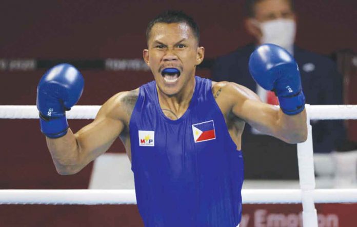 olympic Filipino boxer Eumir Marcial reacts after winning his fight against Armenian Arman Darchinyan on Sunday at the Kokukigan Arena in Tokyo, Japan. Marcial is set to face Oleksandr Khyzhniak of Ukraine in the semifinals on August 5. REUTERS/UESLEI MARCELINO