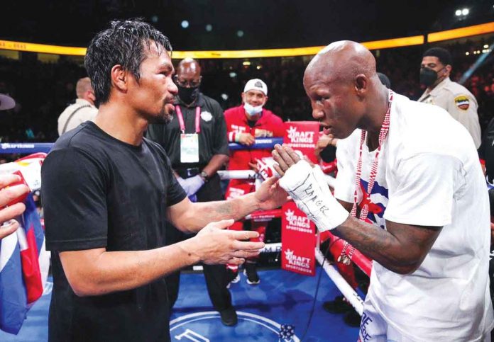 pacman-ugas Cuban boxer Yordenis Ugas (right) praises Manny Pacquiao after their WBA world welterweight championship encounter on Sunday. "Manny Pacquiao might be in his 40s, but he gave me a very good fight," says Ugas who won via unanimous decision. CHOOKS-TO-GO