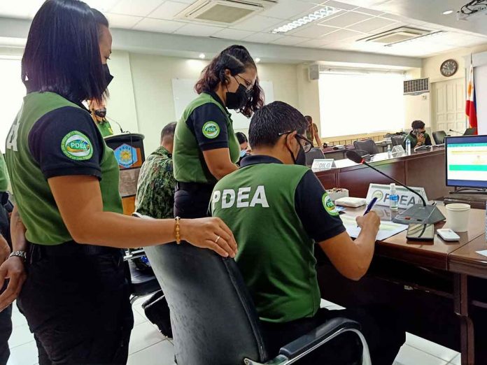 pdea-deliberates The Philippine Drug Enforcement Agency in Region 6 headed by Director Alex Tablate deliberates the barangay drug clearing at the Police Regional Office 6 in Iloilo City yesterday.