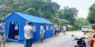 This is a border control checkpoint in Barangay Salvacion, Nueva Valencia, Guimaras. Only Authorized Persons Outside Residence (APOR) and those that need immediate medical attention shall be allowed to leave and/or enter the barangay. PHOTO BY THE NUEVA VALENCIA LGU.