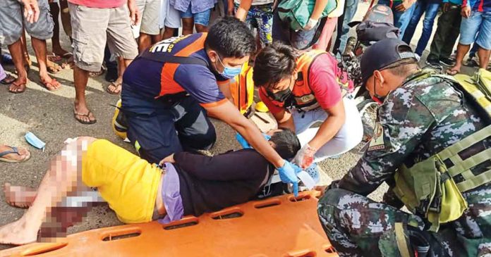 accident Responders tend to a victim of a vehicular accident in Barangay Lopez Jaena, Sagay City, Negros Occidental. SAGAY CITY FIRE STATION