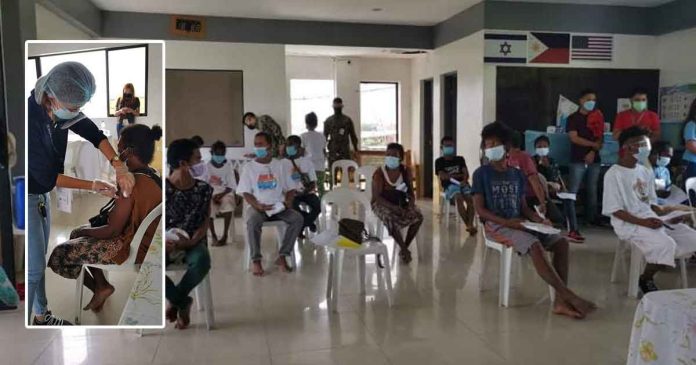 ati-community-vax Members of the Ati community in Barangay Lanit, Jaro, Iloilo City get vaccinated against coronavirus disease 2019. PHOTOS BY SYLVIA ELOSENDO OF LANIT ATI COMMUNITY, EA HECTOR ALEJANO