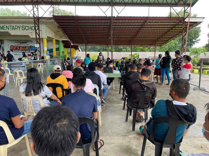 Eligible residents wait their turn for vaccination in Manapla, Negros Occidental. MANAPLA RHU