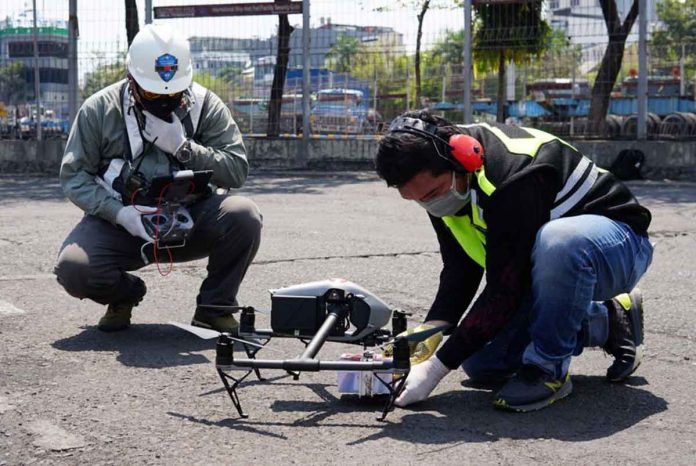 Volunteers of the Makassar Recover Medic Drone prepare an unmanned aerial vehicle to deliver medical supplies for coronavirus disease patients in Makassar, South Sulawesi province, Indonesia. REUTERS/ABD. RAHMAN MUCHTAR