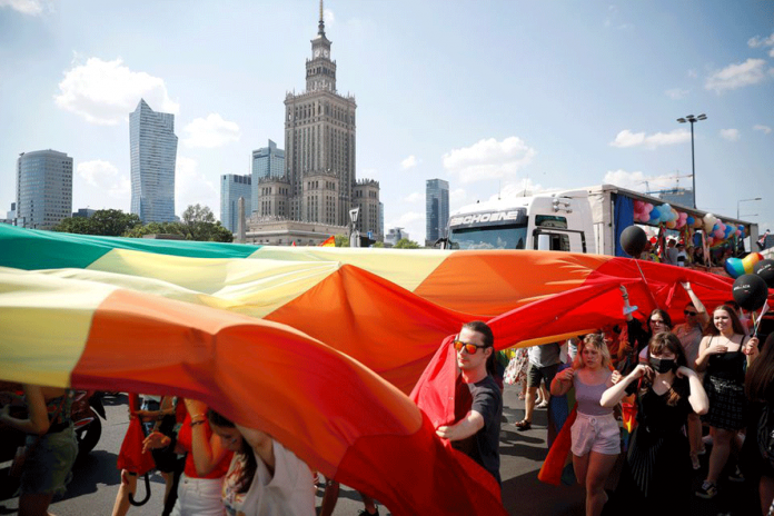 eu-warns-polish-regions People attend the “Equality Parade” rally in support of the LGBT community, in Warsaw, Poland. REUTERS/KACPER PEMPEL