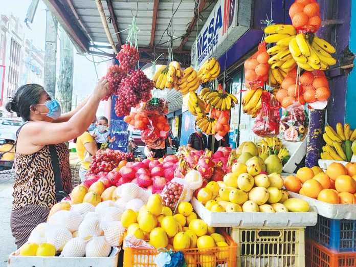 fruit-stand-iloilo ‘TIS THE SEASON TO BE FRUITY. It’s that time of year again. Stalls at the Iloilo Central Market are teeming with a variety of colorful fruits abundant in the months leading up to December. The availability of lots of fruits is one of the greatest things about the holiday season.
