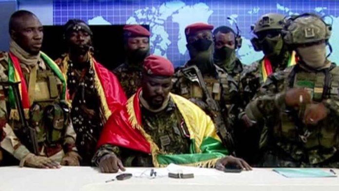 guinea-cop The soldiers appear on national television, saying they seized power because of rampant corruption and poverty in Guinea. GUINEA TV