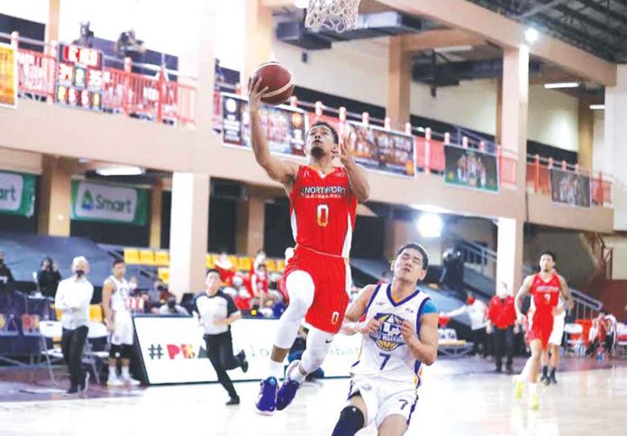 northport-routs-nlex Ilonggo Juan Paolo Taha of NorthPort Batang Pier goes up for a layup against NLEX Road Warriors’ defense during the 2021 PBA Philippine Cup game on Sunday night at the Don Honorio Ventura State University Gym in Bacolor, Pampanga. The Batang Pier improved to a 4-3 win-loss record with their 96-94 victory over the Road Warriors. PBA