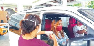 Dry-run of the drive-thru vaccination in San Joaquin, Iloilo on Aug. 14. PHOTOS FROM BM MARCELO VALENTINE SERAG
