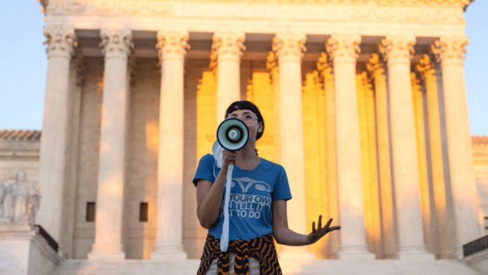 texas-abortion An activist protests against the new Texas abortion law outside the Supreme Court in Washington DC. GETTY IMAGES