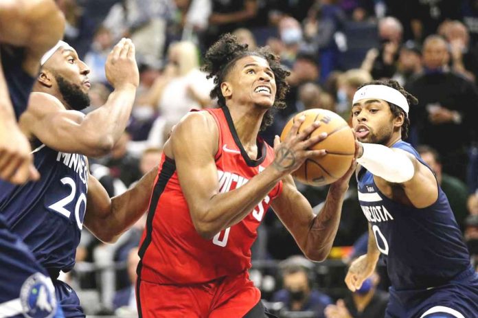 Houston Rockets guard Jalen Green drives on Minnesota Timberwolves forward Josh Okogie Houston Rockets guard Jalen Green drives on Minnesota Timberwolves forward Josh Okogie (20) and Timberwolves guard D'Angelo Russell, right, during their NBA game in Minneapolis. AP PHOTO, ANDY CLAYTON-KING