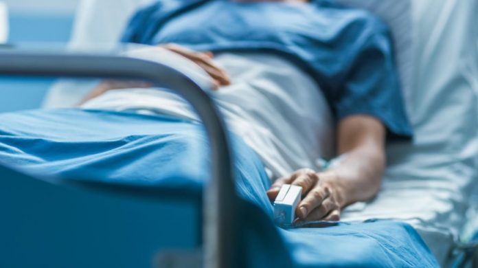 Patient on Hospital Bed Photo for representation only.