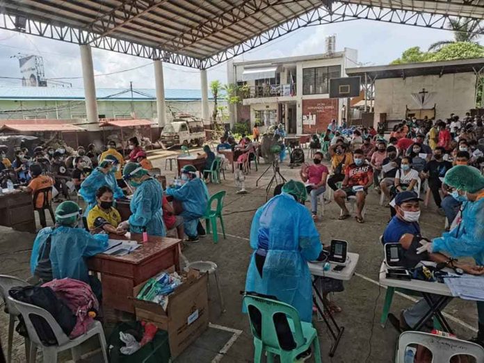 coiv-jabs Priority residents wait their turn to avail themselves of free anti-coronavirus disease jabs in Barangay Ungka, Pavia, Iloilo. PHO