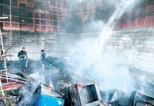 Fire hits junk shop Thick smoke blankets this fire-hit junk shop in Barangay Lapayon, Leganes, Iloilo. PANAY NEWS PHOTO