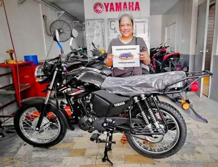 1st Sorpresaya winner of a brand new motorcycle, Jocelyn Vargas of Valenzuela City