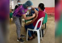 Iloilo’s COVID cases down 47% A healthcare worker administers a coronavirus disease 2019 vaccine to a resident of Concepcion, Iloilo. MAYOR RAUL BANIAS