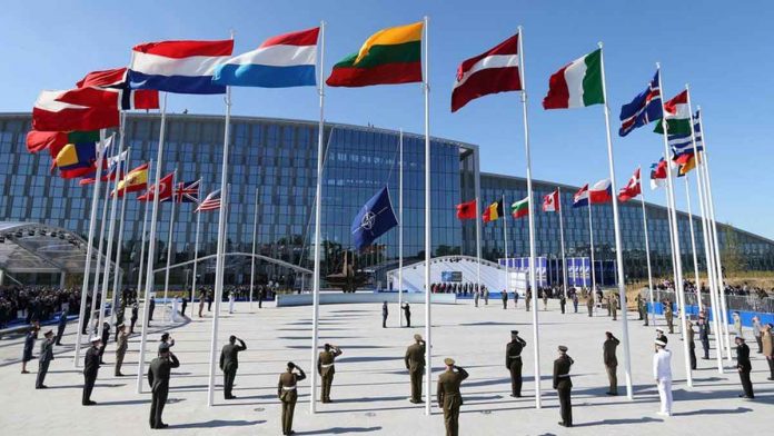 Nato has halved the size of the Russian contingent at its Brussels headquarters from 20 to 10. REUTERS