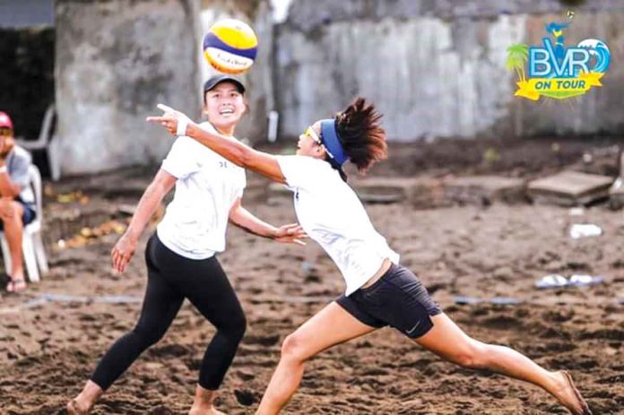 negros Team Delimondo’s Bianca Lizares (left) and Mary Jolyn Ebro prepare for the BVR On Tour in Santa Ana, Cagayan. BVR ON TOUR PHOTO