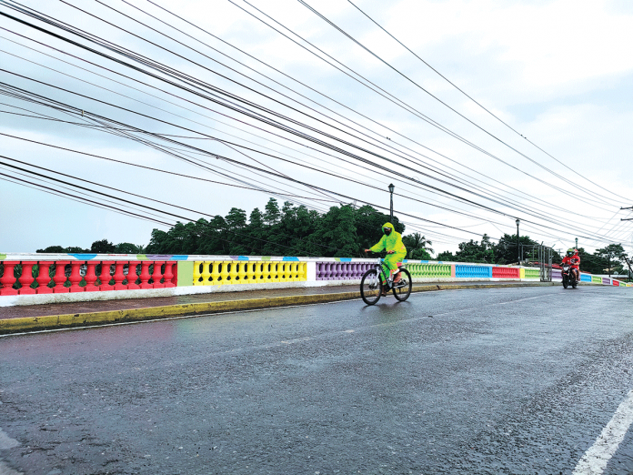 Passersby are enjoying the sight of this “rainbow bridge” in Barangay Aganan, Pavia, Iloilo. This brings out good vibes amid the bad weather and coronavirus pandemic. PANAY NEWS PHOTO