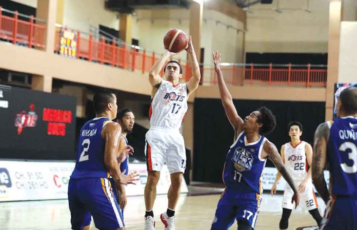 sports-meralco Ilonggo Antonio Jose Caram of Meralco Bolts pulls up for a basket against NLEX Road Warriors. PBA MEDIA BUREAU