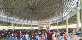 BRGY-BASED VAXX. Eligible residents wait their turn to get vaccinated against coronavirus disease 2019 at the municipal gymnasium of New Lucena, Iloilo. PHO