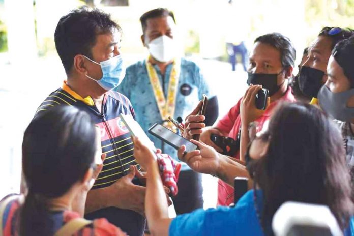 CHED Universities have bigger facilities that they can convert into vaccination sites, Commission on Higher Education chairperson J. Prospero De Vera III (left) tells reporters during a visit to Iloilo City on Nov. 25. PHOTO FROM ISAT-U FACEBOOK PAGE