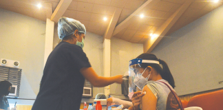 A healthcare worker availed herself of a coronavirus disease booster shot at the West Visayas State University Cultural Center. PANAY NEWS PHOTO